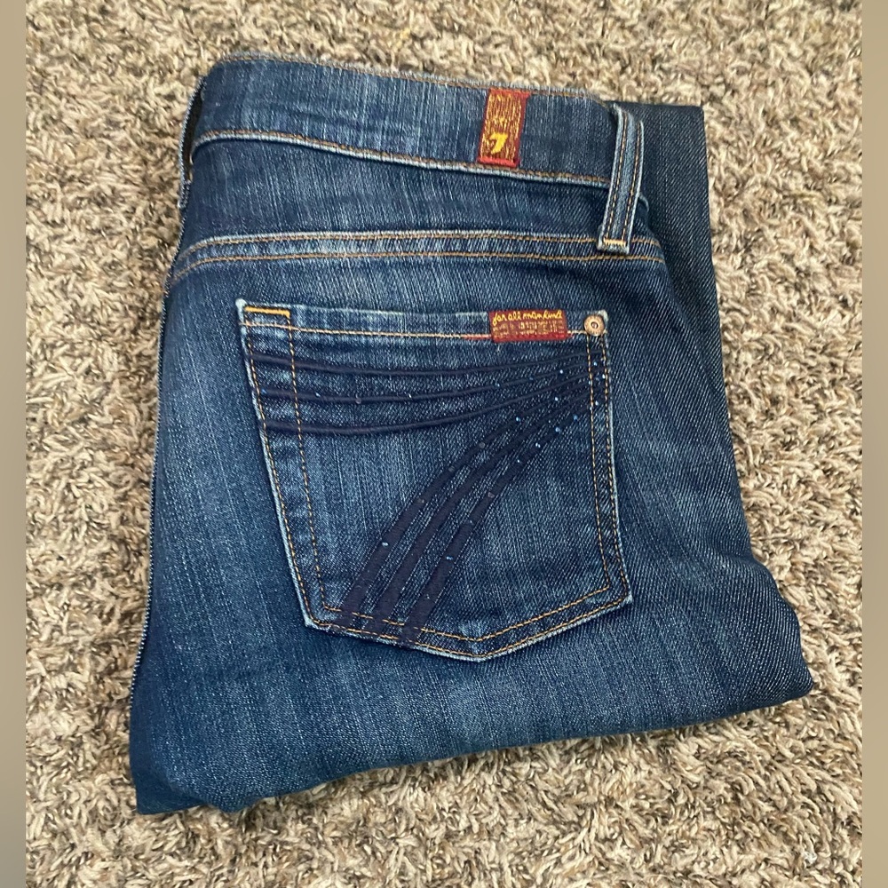 Dude these are seriously so cute the 7s on the butt have lil gems DOJO Jeans